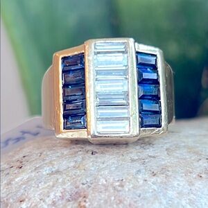 Designer, 18 karat gold, diamond, and blue sapphire Stones
